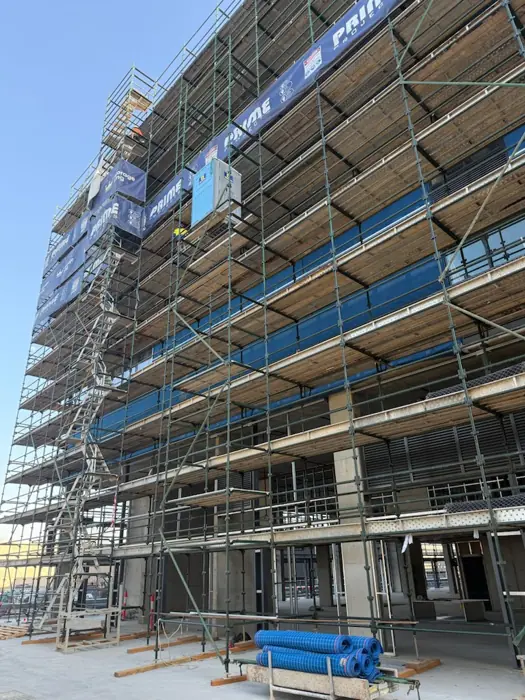 Scaffold access along an apartment building facade