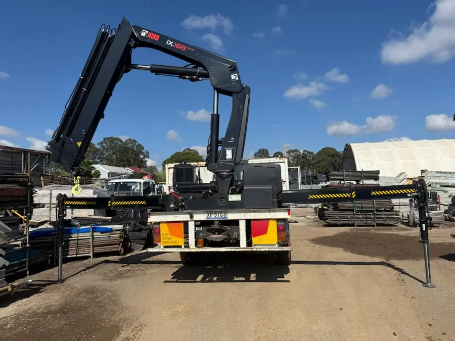 Crane truck supporting scaffold equipment handling